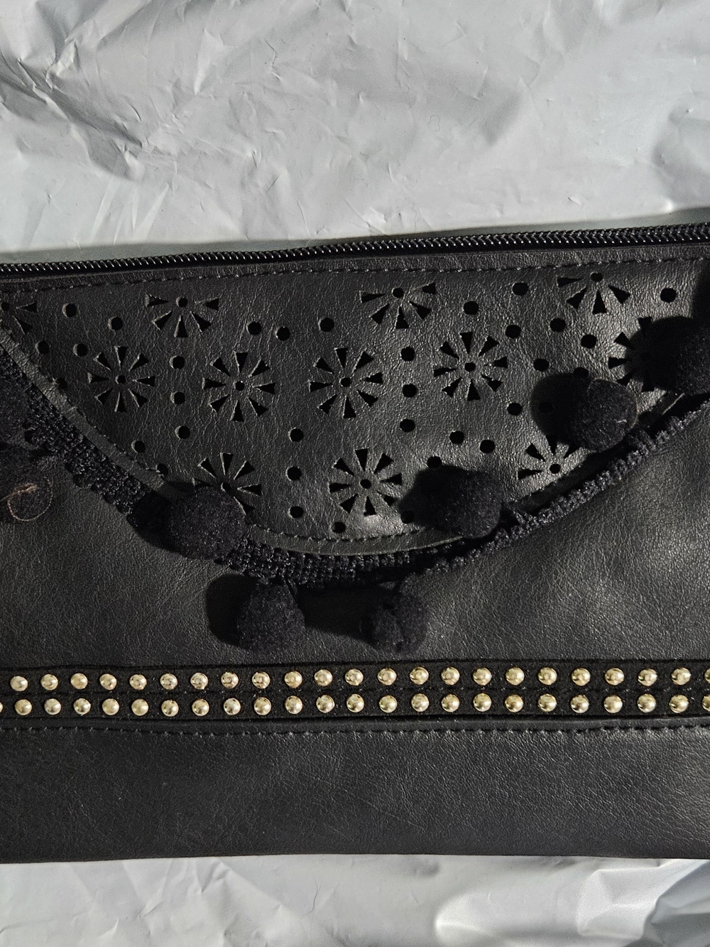 Black Laser-Cut Pom-Pom Clutch with Stud Trim